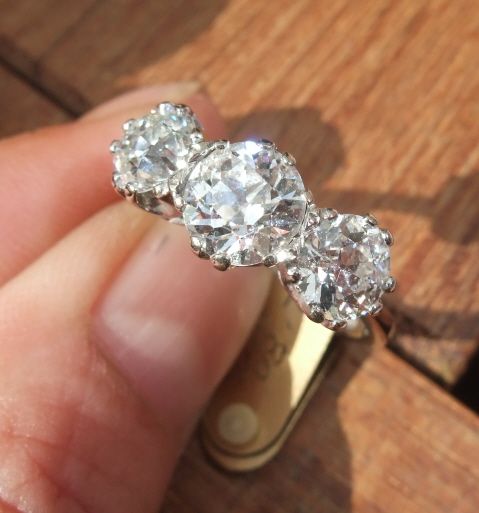 Old cut diamond trilogy ring almost 3 carats