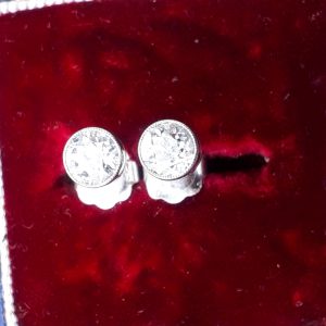 SOLD. Platinum solitaire Antique diamond studs