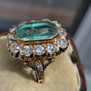 An Important French Emerald & Old Cut Diamond Cluster ring