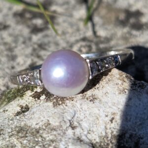 Art Deco natural Pearl & Diamond solitaire.